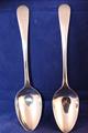 A pair of Georgian pudding spoons