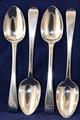 A set of four George IV pudding spoons