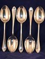 Five pairs of Lilly pattern silver pudding forks and spoons