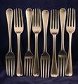 A set of eight George III sterling silver Old English pattern dessert forks