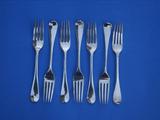 Matched set of Seven silver table forks