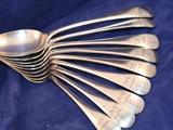 A set of 9 old english pudding spoons