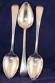 A trio of late Georgian serving spoons