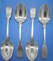 Four Victorian fiddle pattern sterling silver dessert spoons