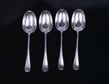 Four silver dessert spoons