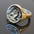 A traditionally deep seal engraved Oxford Oval signet ring from Rebus