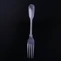 A Victorian fiddle and thread pattern sterling silver table fork