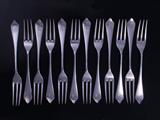 Twenty eight silver dessert forks