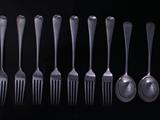 Eight silver table forks