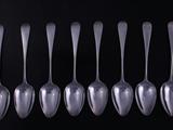 Eight Regency silver dessert spoons