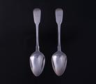 Two George IV fiddle pattern sterling silver dessert spoons