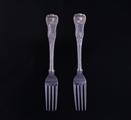Two George IV silver table forks