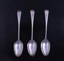 A set of three George III fiddle pattern sterling silver table spoons