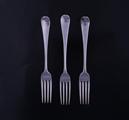 Three George III silver table forks