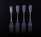 Four antique silver dessert forks
