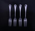 Four sterling silver dessert forks
