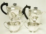 An Antique George V English Sterling Silver Art Deco Style Four Piece Tea and Coffee Service