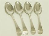 A Set of Four Antique George III English Sterling Silver Table Spoons