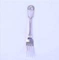 A Victorian sterling silver fiddle, thread and shell pattern table fork