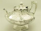 A Fine, Impressive and Unusual Antique Victorian English Sterling Silver Teapot with Newcastle Interest