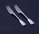 A pair of Victorian sterling silver fiddle, thread and shell pattern table forks