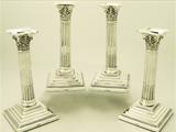 A Very Good Set of Four Antique George V English Sterling Silver Corinthian Column Candlesticks