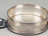 Four various George III silver nozzles for candlesticks