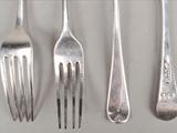 A set of thirty four George III silver Old English pattern table forks