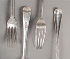 A set of fifteen George III silver Old English bead pattern dessert forks