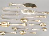 A collection of silver gilt flatware