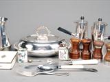 A collection of silver, silver and plated flatware