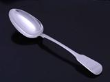 A George IV sterling silver fiddle pattern table spoon