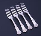 A set of four George IV King's pattern sterling silver dessert forks