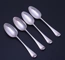 A set of four George III sterling silver table spoons