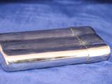 A silver plate cigar tube