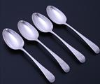 Set of four George III Old English pattern sterling silver table spoons