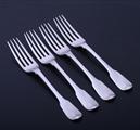 Set of four George III sterling silver fiddle pattern table forks