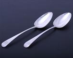 A matched pair of George III sterling silver Old English pattern table spoons