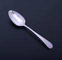 A George III sterling silver Old English pattern table spoon