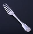 A William IV sterling silver fiddle, thread and shell pattern table fork