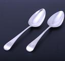A pair of George III sterling silver Old English pattern table spoons
