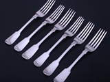 A matched set of six Victorian sterling silver fiddle pattern table forks
