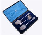 A pretty cased set of antique silver gilt