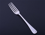 A George III sterling silver Old English pattern table fork