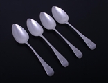 Matched set of four George III sterling silver Old English pattern dessert spoons