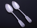 A pair of William IV fiddle pattern sterling silver table spoons