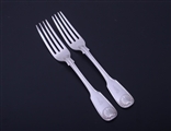 A pair of Victorian fiddle, thread and shell sterling silver table forks
