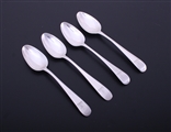 A matched set of four George III Old English pattern sterling silver teaspoons
