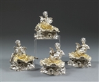 A set of four Victorian Figural Salt Cellars