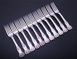 Set of eleven George IV King's pattern sterling silver table forks